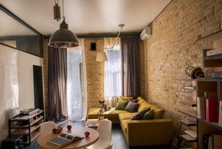 Apartament studio cu 1 camera cu peretii cu caramida