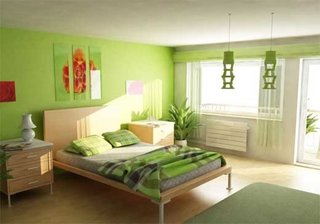 Dormitor zugravit in alb cu verde si mobila simpla din lemn