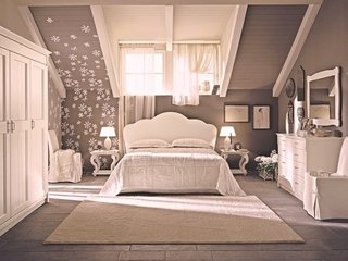 Dormitor romantic amenajat in culori neutre