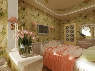 Dormitor amenajat in stil shabby chic cu tapet floral