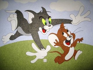 Personaje Tom si Jerry desenate pe tapet lichid